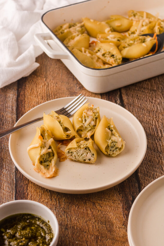 pasta shells stuffed with pesto chicken and cheese