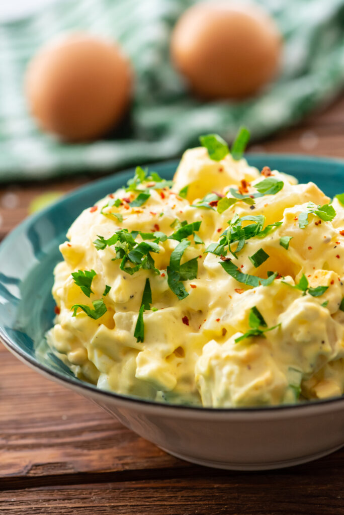 potatoes, celery, onion, and hard boiled eggs combined into a potato salad
