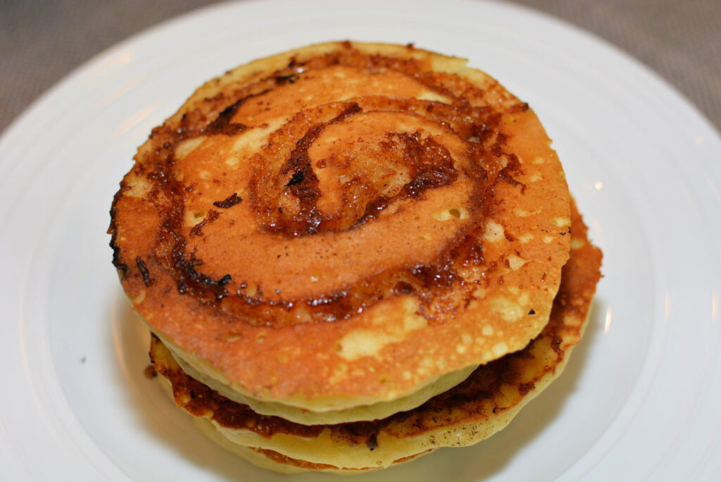 a stack of fluffy pancakes on a plate