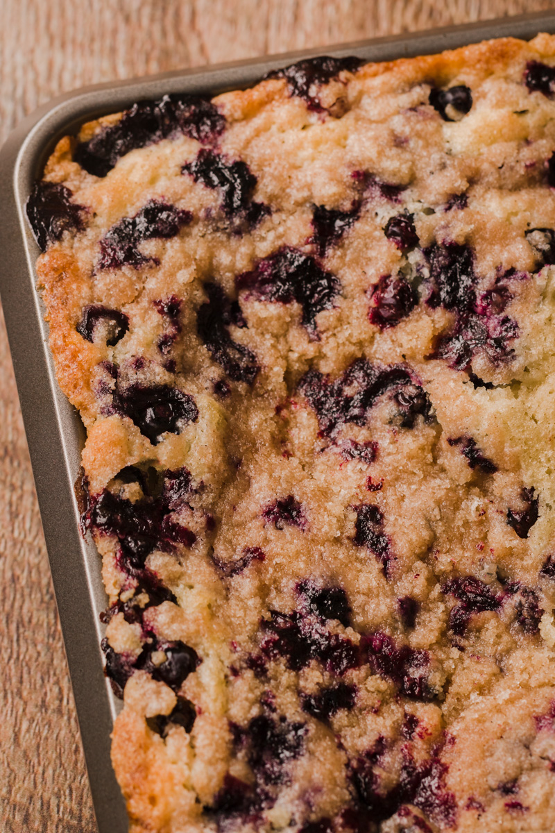 an up close look at a blueberry coffee cake.