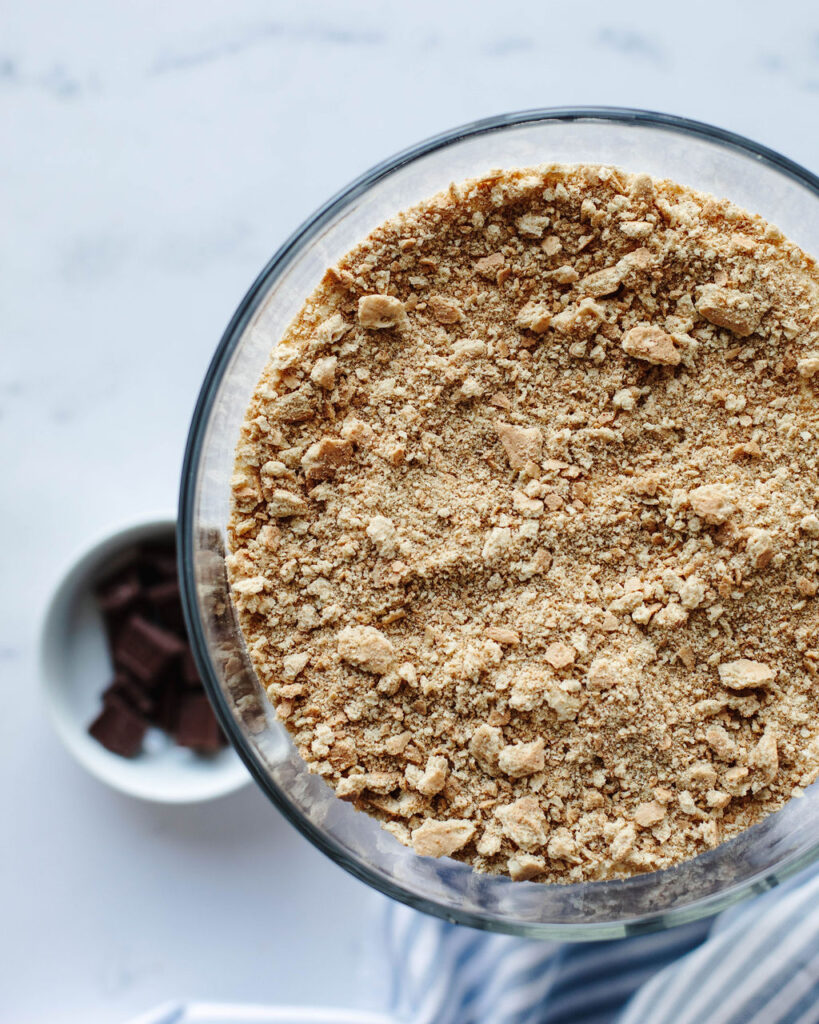 crushed graham crackers layered in a glass bowl.