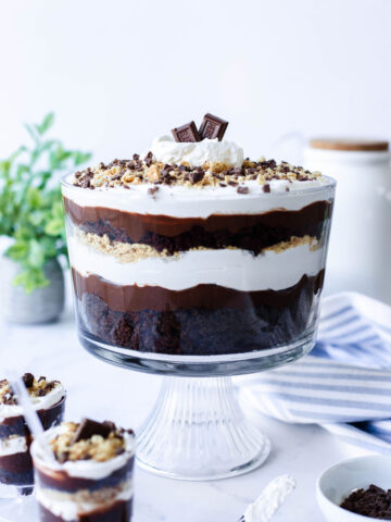 a layered S'mores Trifle in a glass bowl.