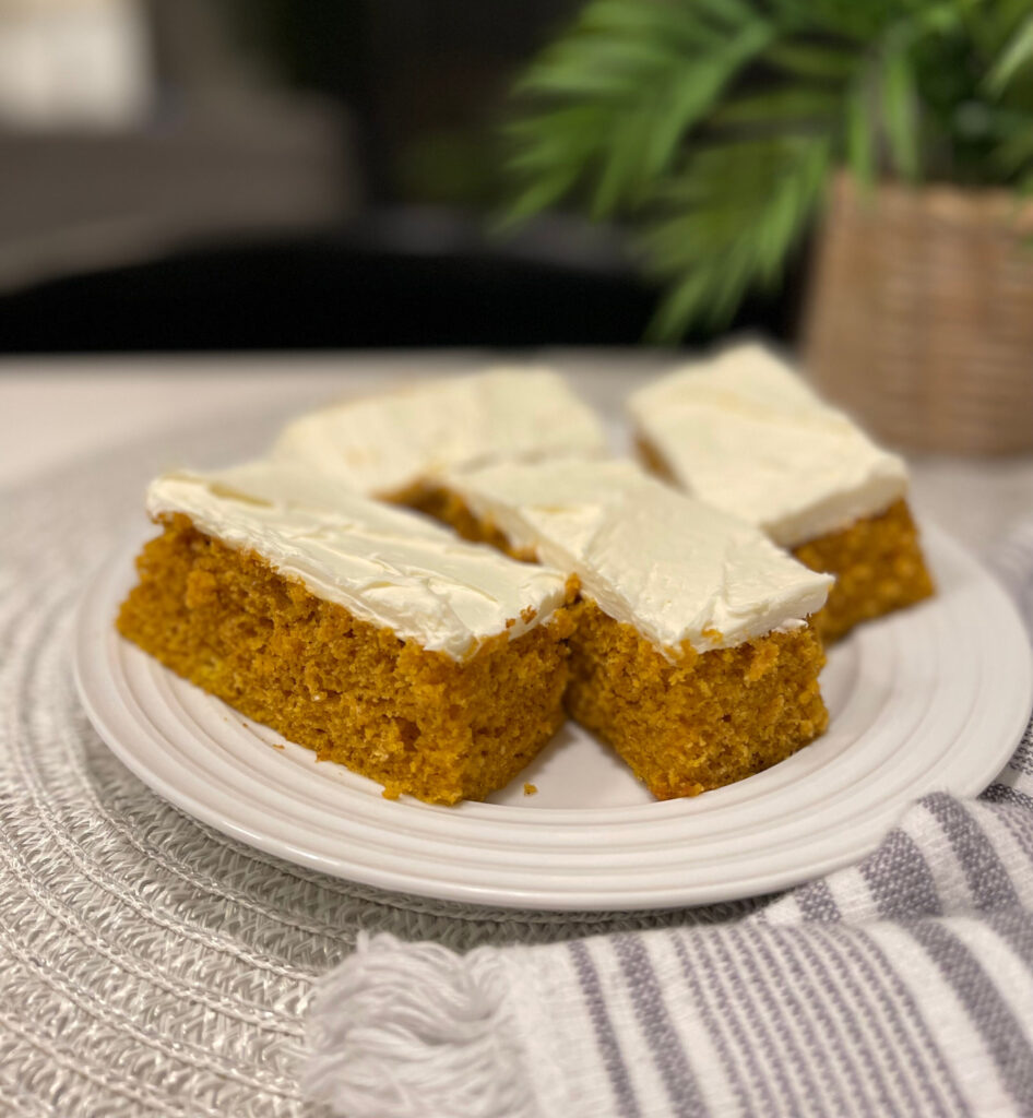 cream cheese frosted pumpkin bars lightly spiced with Fall flavors