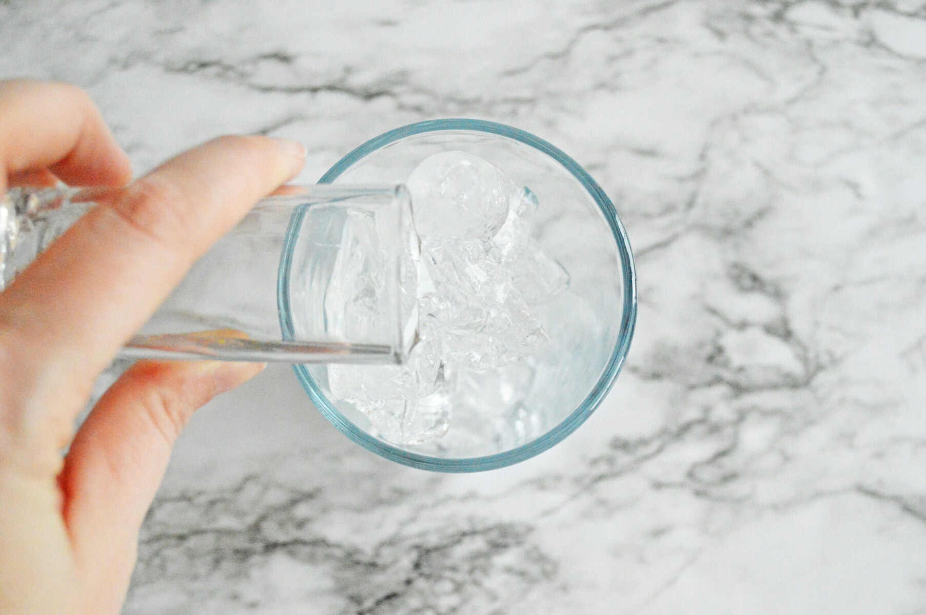 malibu coconut rum poured over ice.