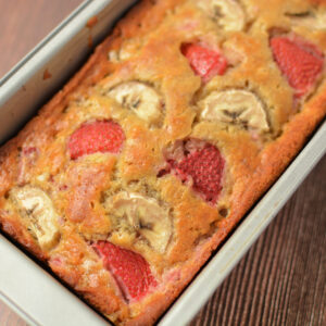 baked and ready to serve quick bread in a loaf pan