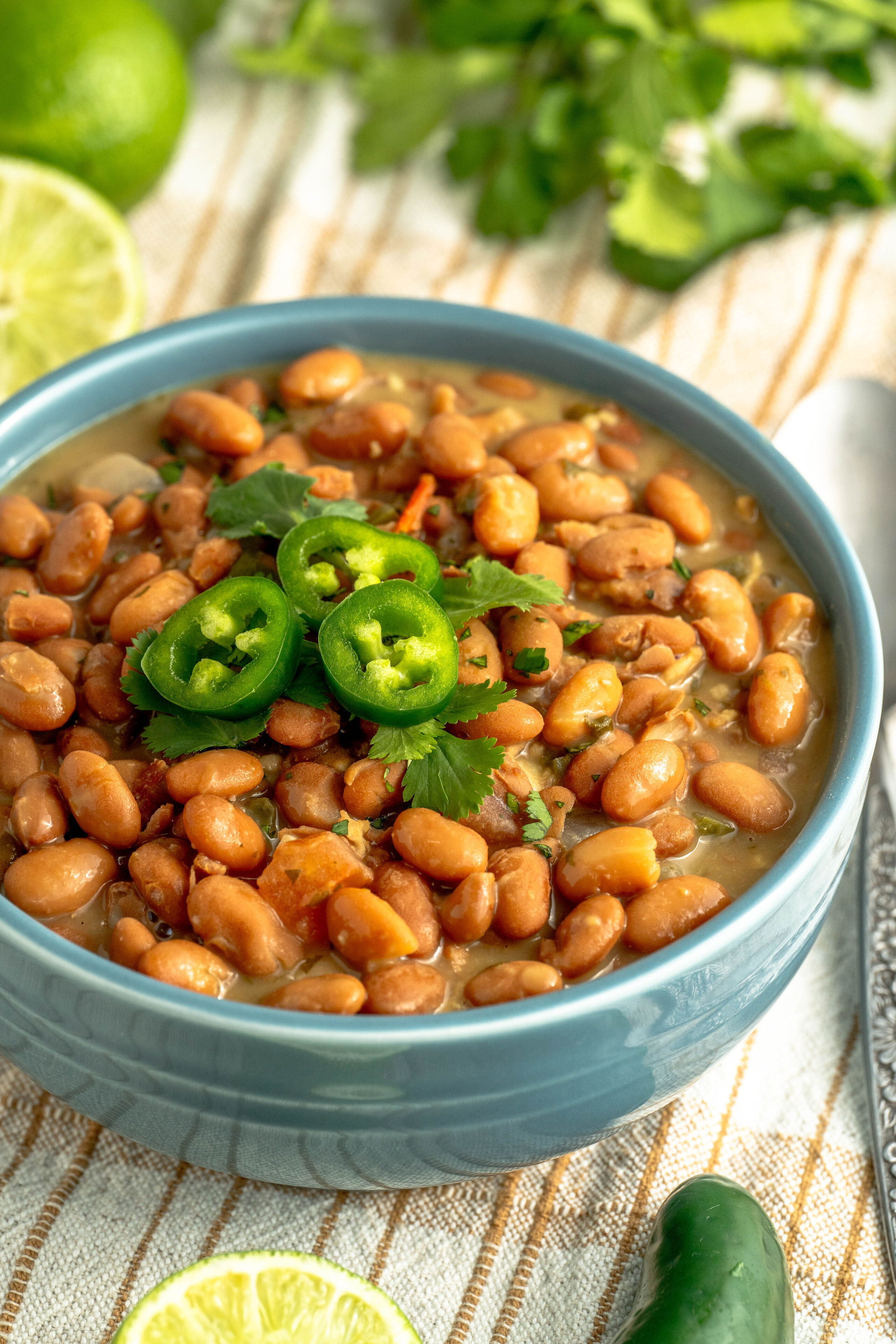 a bowl of Mexican Charro beans served in a bowl.