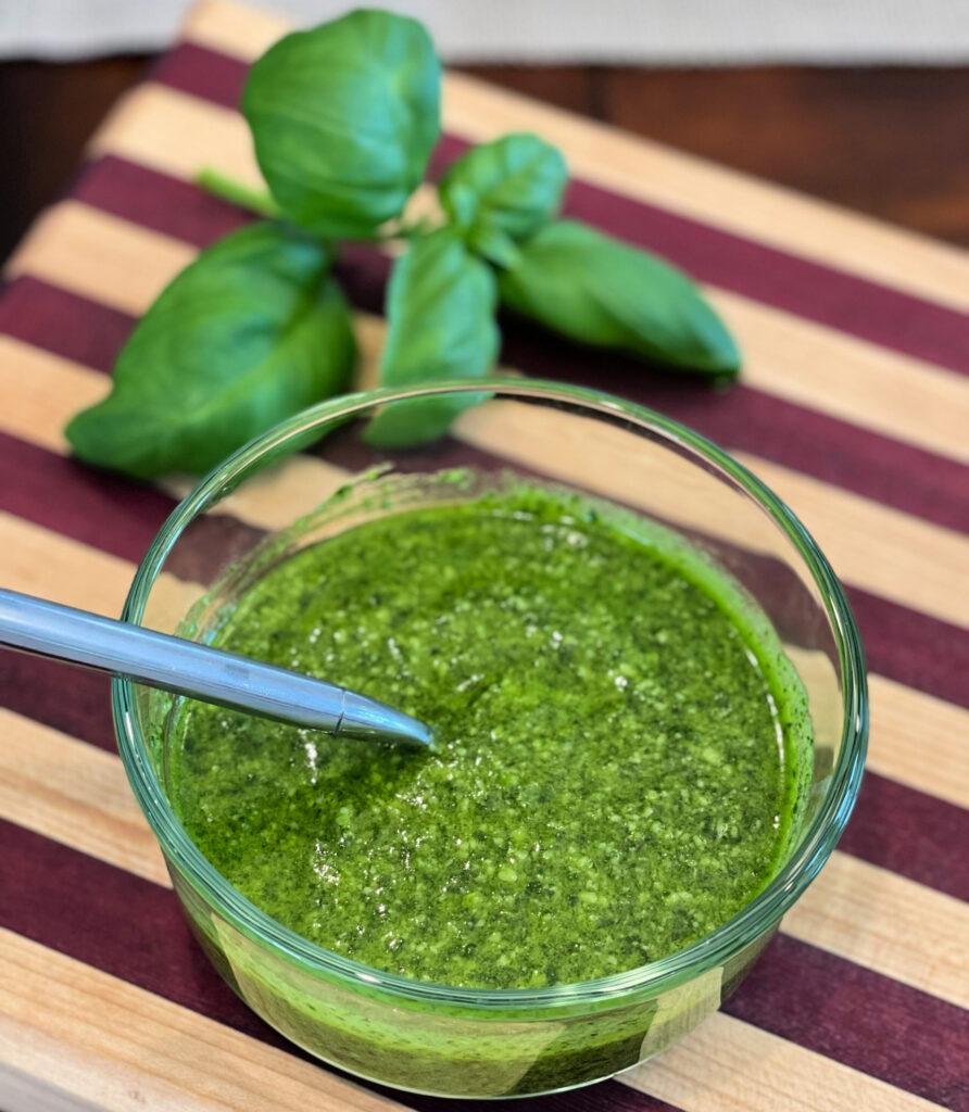 basil, garlic, parmesan, and oil blended into a pesto sauce