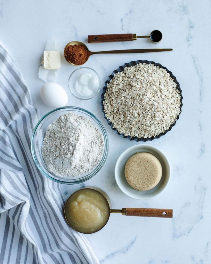all the ingredients needed to make Applesauce Cinnamon Oat Muffins.