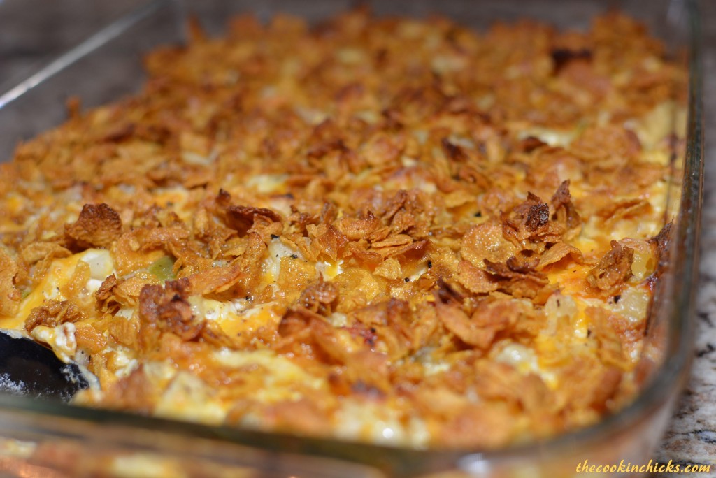 tender potatoes with a cheesy mixture and crunchy cereal topping combine into this hash brown potato bake