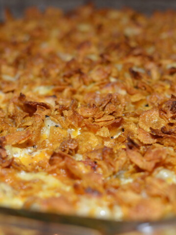 crunchy topping with cheesy, tender potatoes combine into this casserole