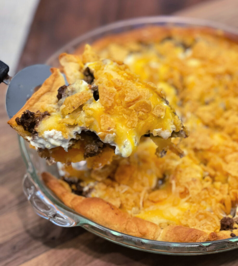 sliced taco pie with crescent roll crust and crushed corn chips
