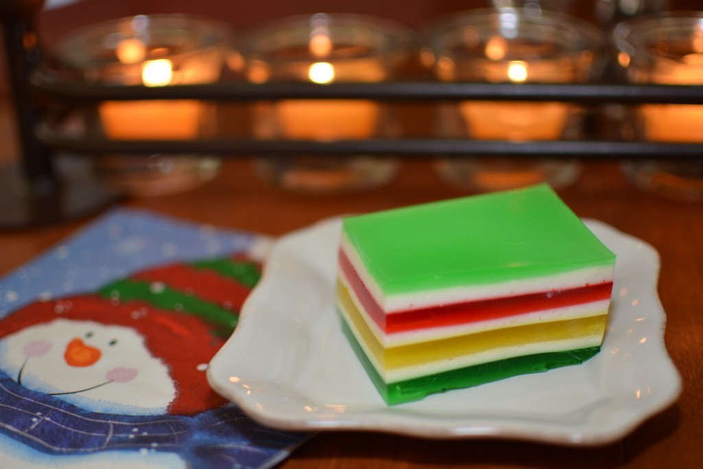 festive colored jello layered to create a sweet treat