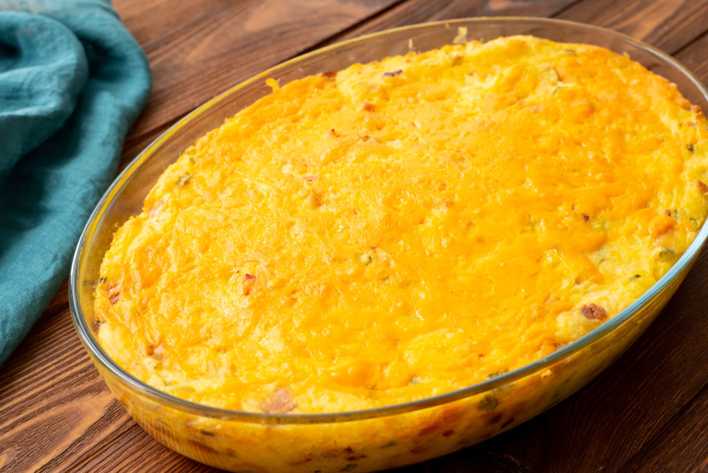 mashed potatoes loaded with bacon, cheese, butter, sour cream, and green onions