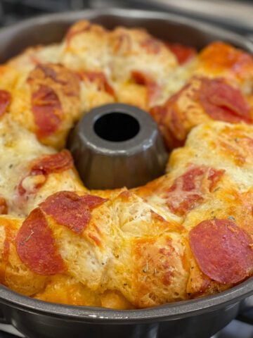 tender biscuit pieces combined with seasonings to create a monkey bread pizza