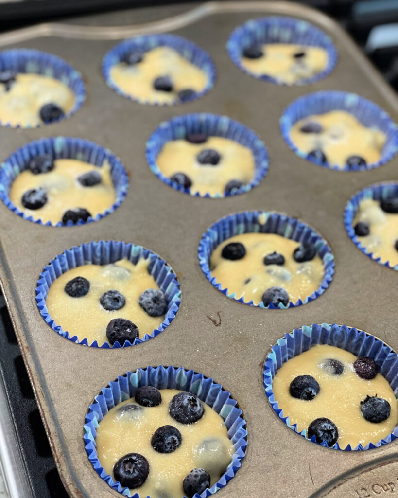 quick and easy muffins with blueberries throughout