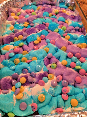chocolate cake layered with melted peeps and m&m candy for Easter