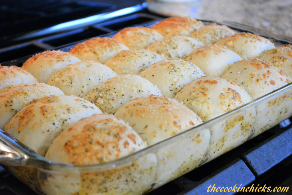 shortcut tender and fluffy dinner rolls with a garlic parmesan topping
