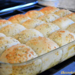 shortcut tender and fluffy dinner rolls with a garlic parmesan topping