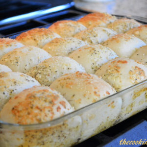 shortcut tender and fluffy dinner rolls with a garlic parmesan topping