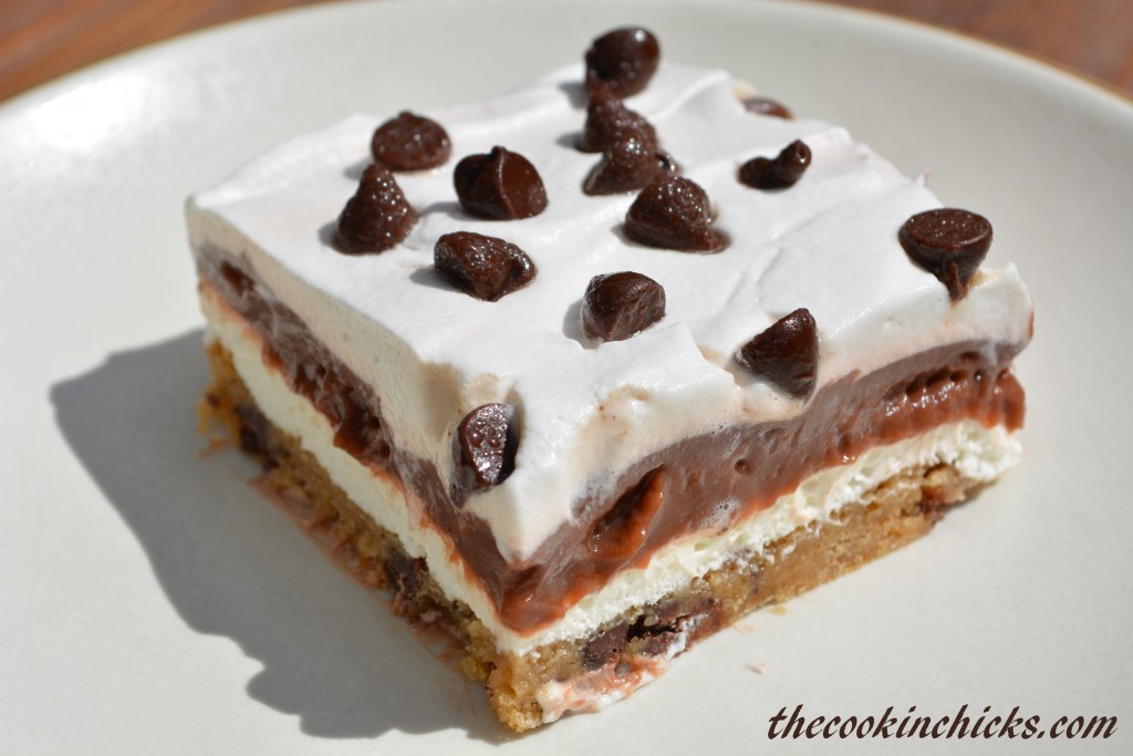 a slice of chocolate chip cookie pudding cake on a plate