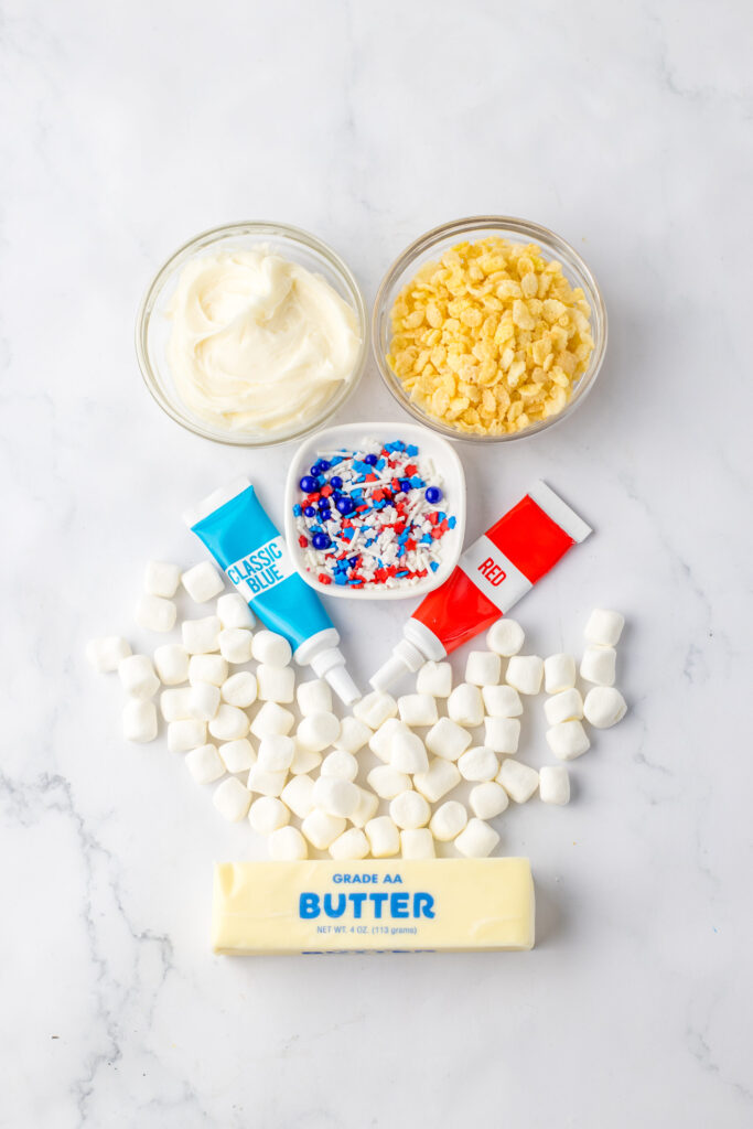 all the ingredients needed to make fourth of july rice krispie treats.
