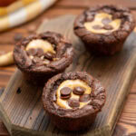 creamy peanut butter in the center of a brownie