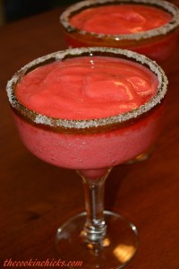blended cocktail with raspberries, tequila, and triple sec
