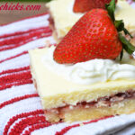 shortbread bars with lemon cream cheese filling and strawberry preserves
