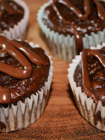 chocolate fudge muffins with banana throughout