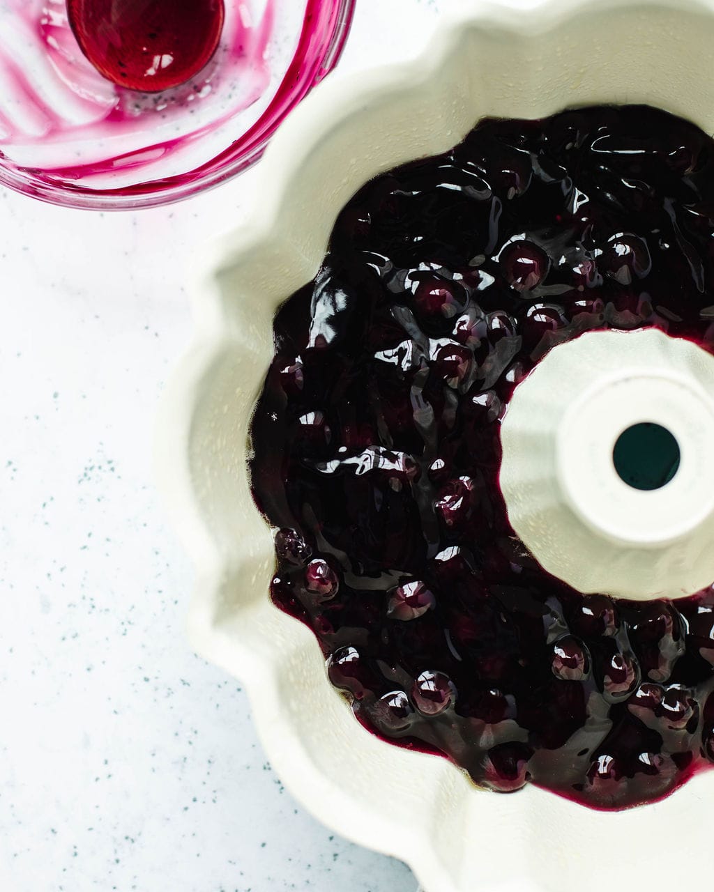 blueberry pie filling in a bundt pan.