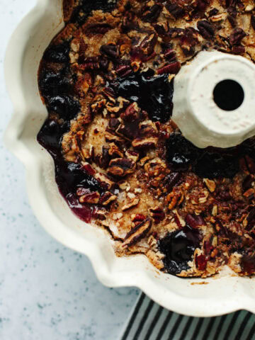 Freshly baked Bisquick blueberry cobbler crisp in a bundt pan with golden topping