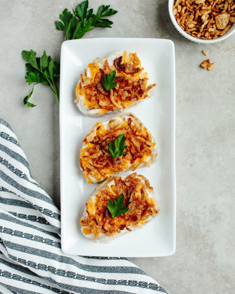 baked pork on a white plate.