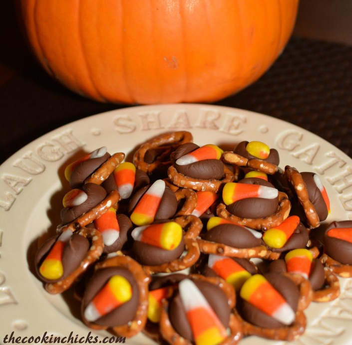 salty and sweet bite sized pretzels with hershey kisses and candy corn