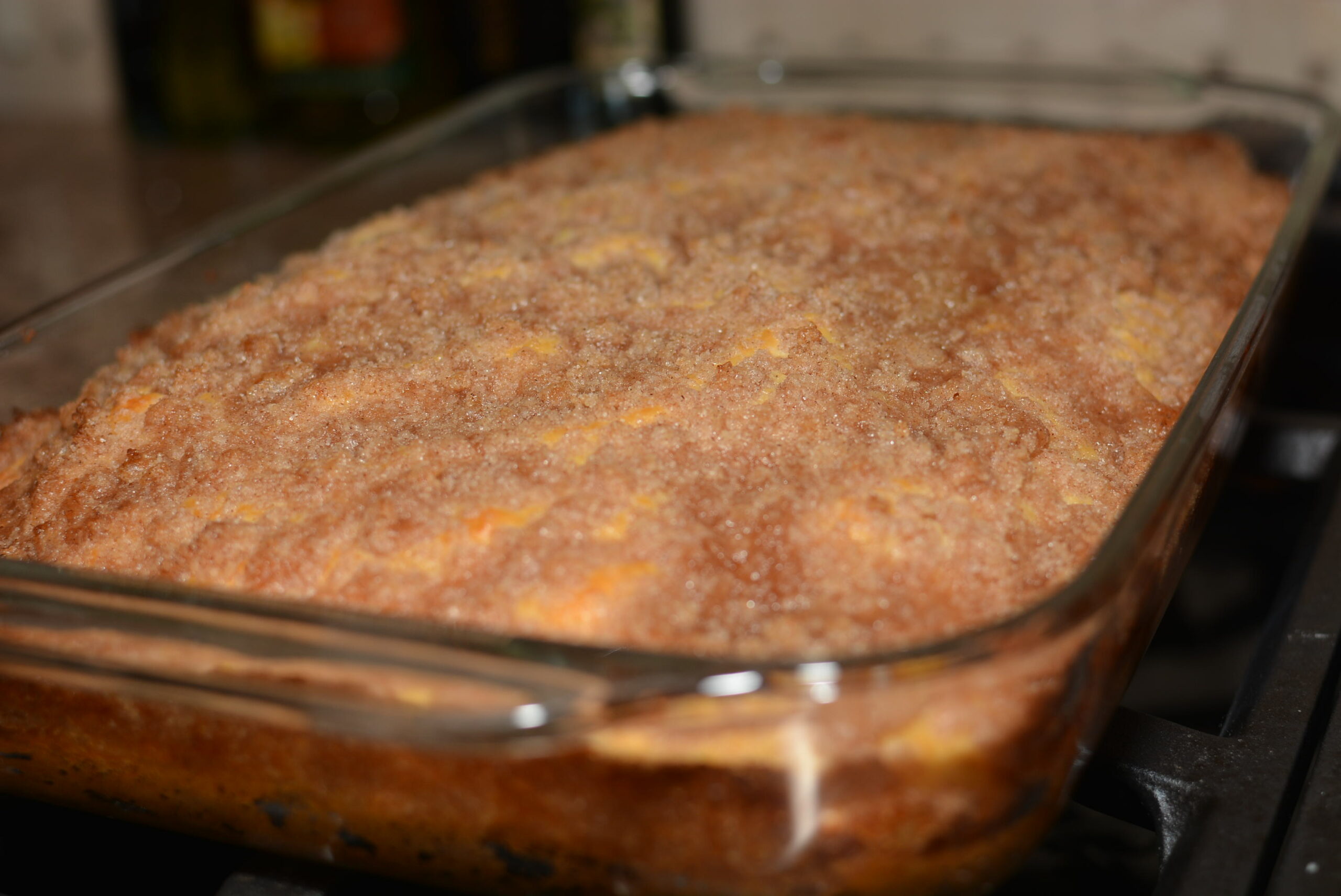a baked morning coffee cake in a baking dish.