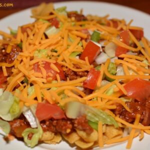 frito corn chips layered with beef, cheese and toppings