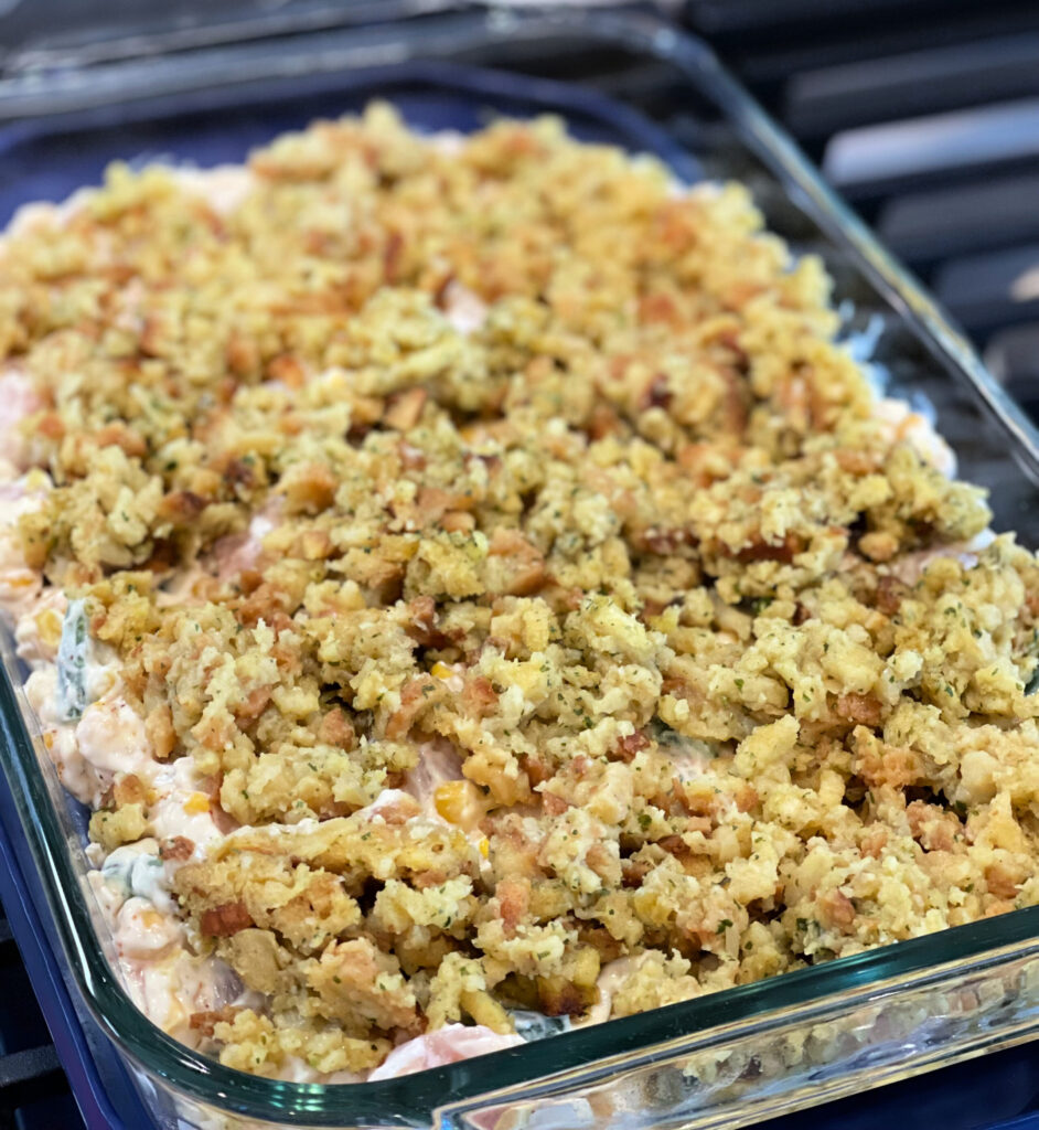 chicken, vegetables, sour cream, and cream of chicken soup topped with chicken stuffing