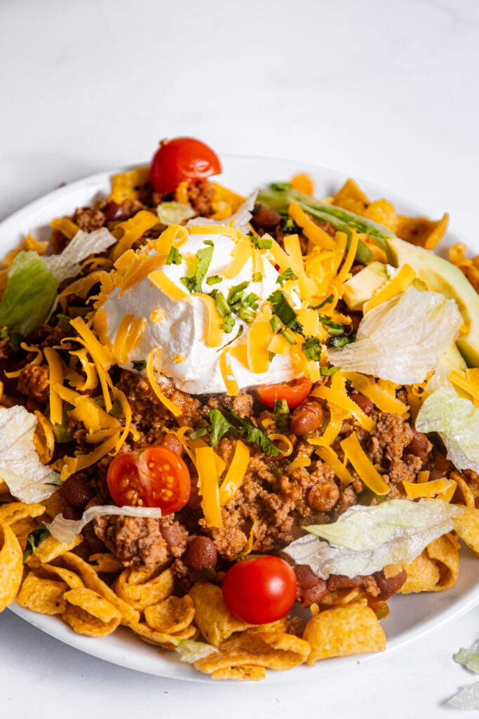 Frito corn chips loaded with a beef mixture and toppings.