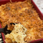 crunchy fried onions on top of a chicken and rice casserole