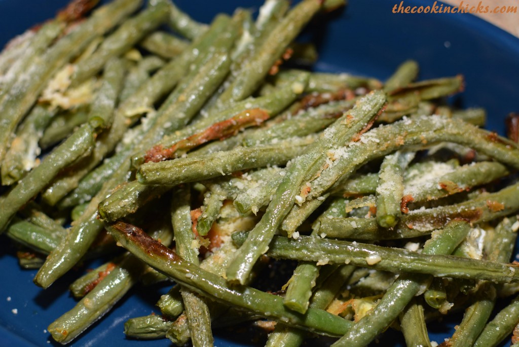 crispy green beans roasted in the oven with parmesan, seasonings, and garlic