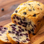 juicy blueberries throughout a vanilla flavored quick bread