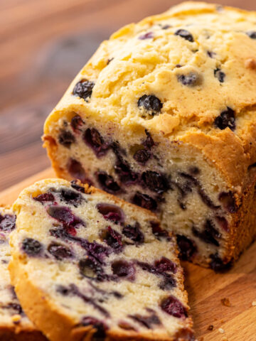 juicy blueberries throughout a vanilla flavored quick bread