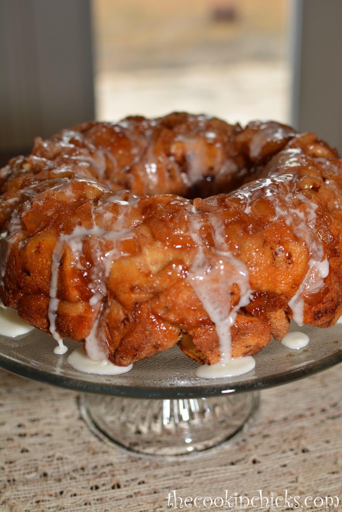 glaze drizzled over cinnamon roll pieces combined with apple chunks for a pull apart sweet treat