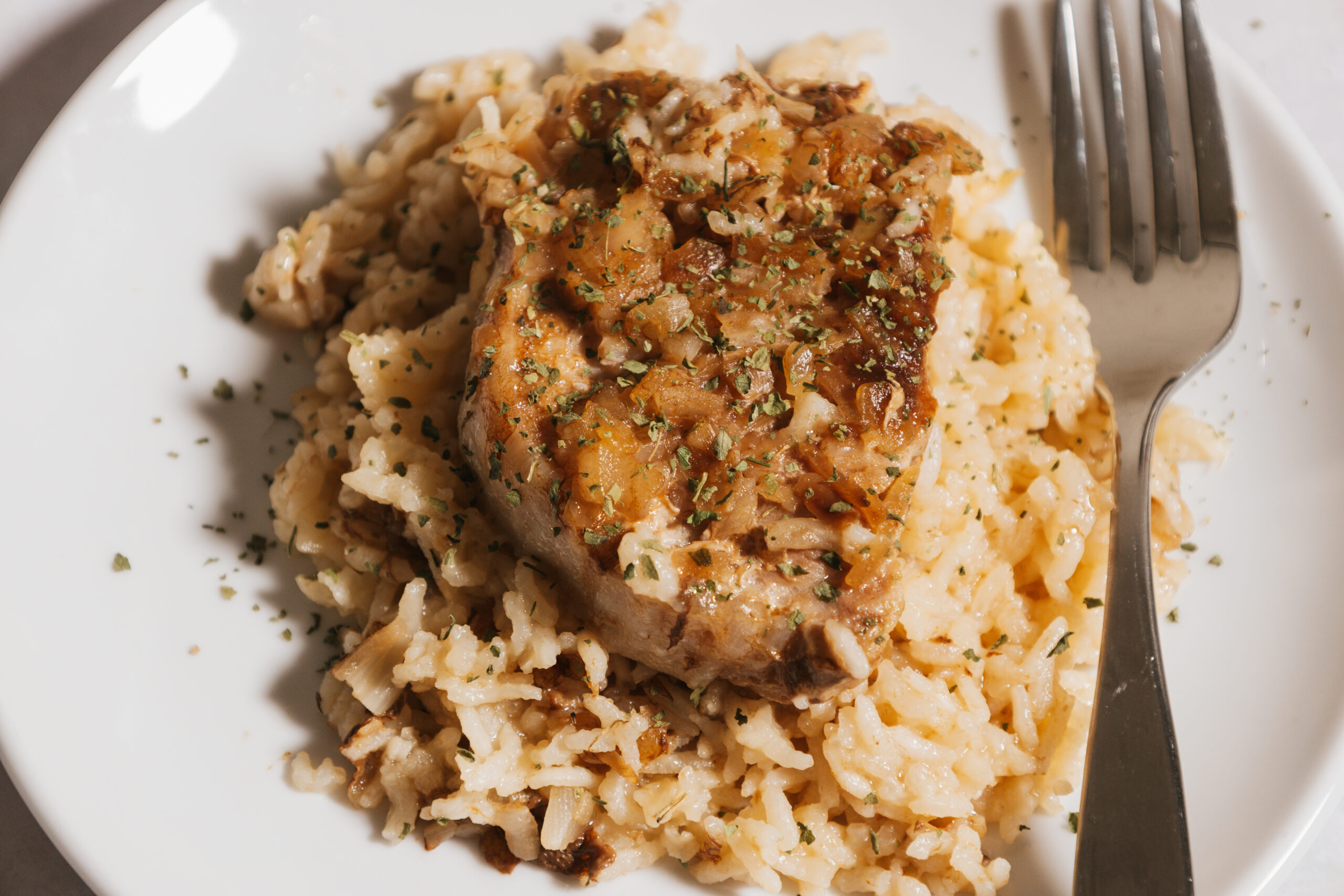 a one pan meal made with simple ingredients and served on a white plate.