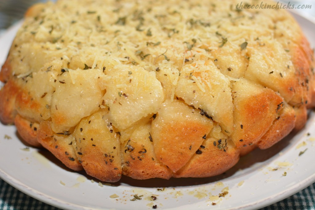 biscuit pieces coated in garlic, butter, and Parmesan for a pull apart bread