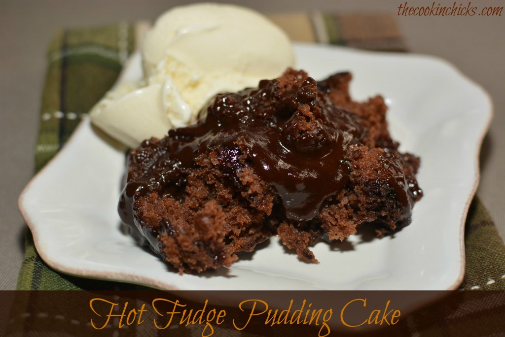 a scoop of hot fudge pudding cake with vanilla ice-cream on the side