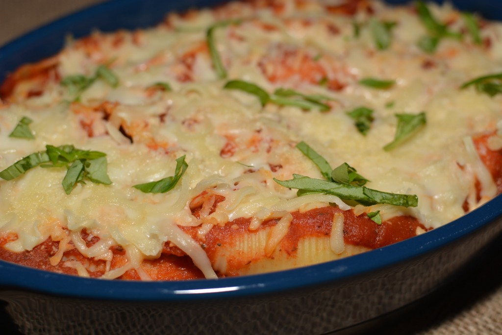 cheesy stuffed shells baked with sauce, beef, and more