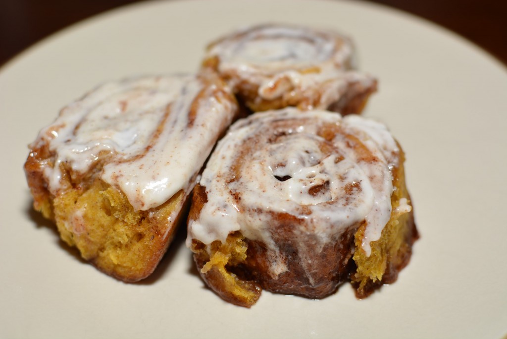 Pumpkin Cinnamon rolls served on a plate