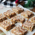 lemon dream bars on a parchment paper ready to serve.