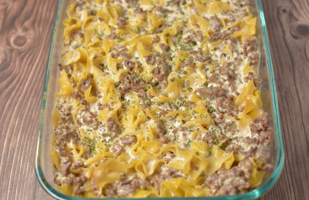 baked beef stroganoff in a glass baking pan