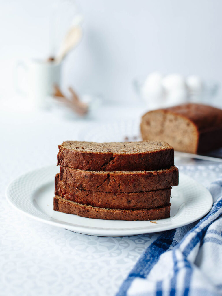 slices of banana bread on a serving plate.